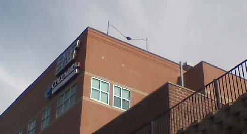 A huge slingshot on top of a building